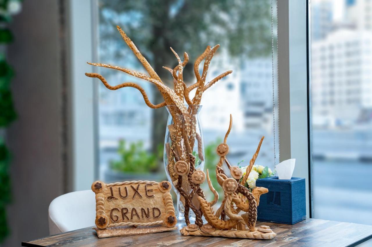 Luxe Grand Hotel Apartments 샤르자 외부 사진 Luxe Grand Hotel