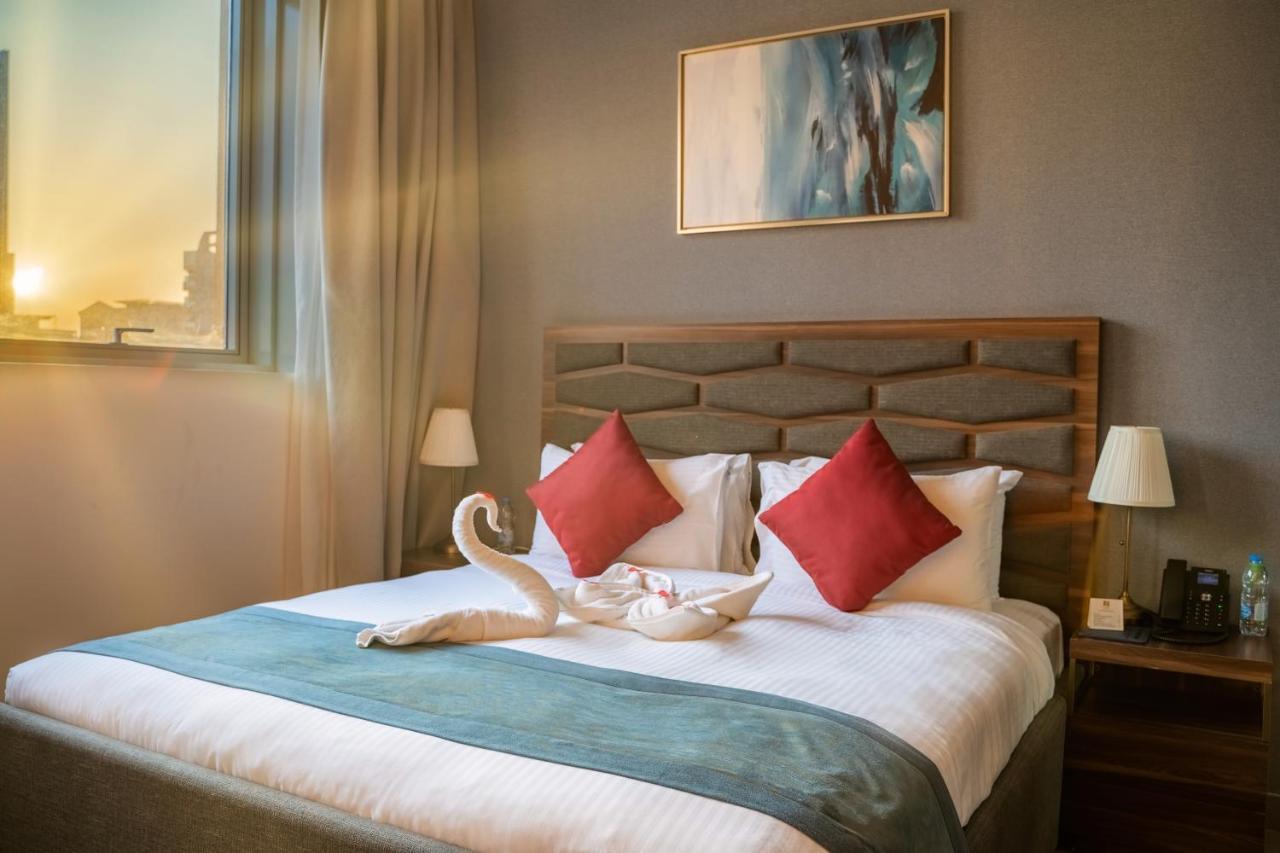 Luxe Grand Hotel Apartments 샤르자 외부 사진 Deluxe Room